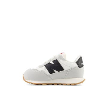 New Balance Kids 237 Bungee Sneaker, White/Black, 3 W Infant (0-12 Months)