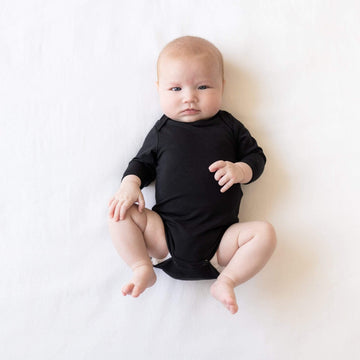 Kyte Baby Unisex Long Sleeve Bodysuit, Rayon Made From Bamboo (3-6 Months, Midnight)