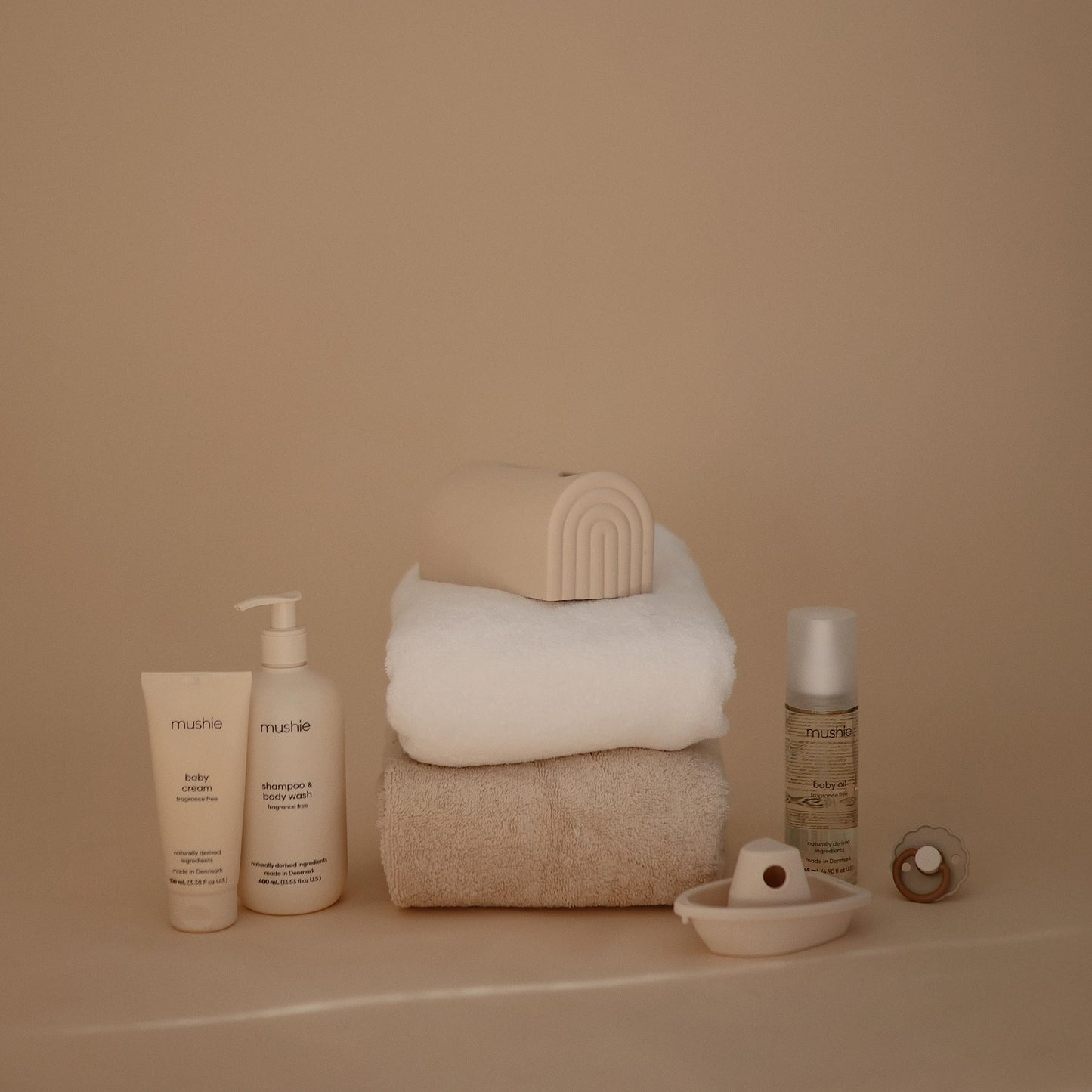 Mushie Bath Spout Cover | Soft Silicone Bathtub Faucet Safety Guard For Kids | Universal Fit (Shifting Sand)