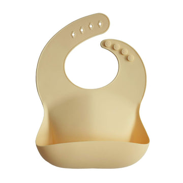 Mushie Silicone Baby Bib | Adjustable Fit Waterproof Bibs (Sunshine)