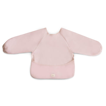 mushie Long Sleeve Baby Bib | Mess Free & Waterproof Fabric for Toddlers | Adjustable Fit for Ages 6-24 Months (Blush)
