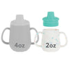 Nuby First Training Cup - Silicone Cup with Free-Flow Spout and Easy-Grip Design - 2 oz - 6+ Months - Aqua and Sprinkles