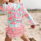 RuffleButts Baby Girls UPF 50+ Sun Protection Tropical Print Long Sleeve One Piece Rash Guard Swimsuit with Zipper - Fab Flaming