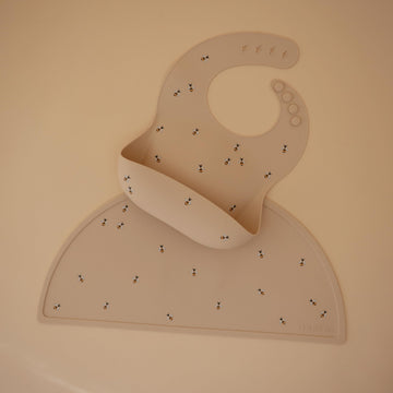 Mushie Silicone Baby Bib | Adjustable Fit Waterproof Bibs (Bees)