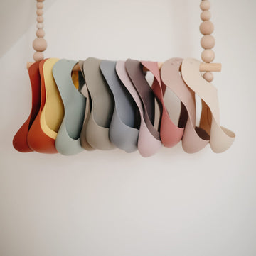 Mushie Silicone Baby Bib | Adjustable Fit Waterproof Bibs (Dusty Rose)