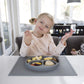 ezpz Happy Mat - 24 Months+ (Gray) - 100% Silicone Suction Plate with Built-in Placemat for Toddlers + Preschoolers - Divided To
