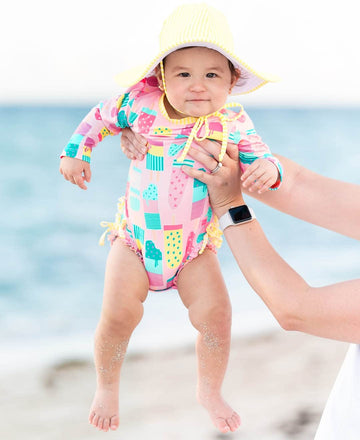 Rufflebutts Baby Girls Upf 50+ Sun Protection Novelty Print Long Sleeve One Piece Rash Guard Swimsuit With Zipper - Ice Cream So