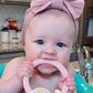 Itzy Ritzy Silicone Teether with Rattle; Rattle Teether Features Rattle Sound, Two Silicone Teething Rings and Raised Texture to