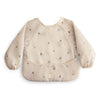 mushie Long Sleeve Baby Bib | Mess Free & Waterproof Fabric for Toddlers | Adjustable Fit for Ages 6-24 Months (Boats)