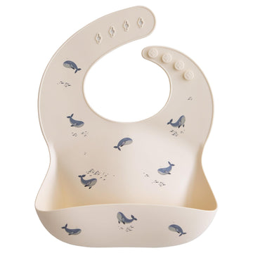 Mushie Silicone Baby Bib | Adjustable Fit Waterproof Bibs (Whales)
