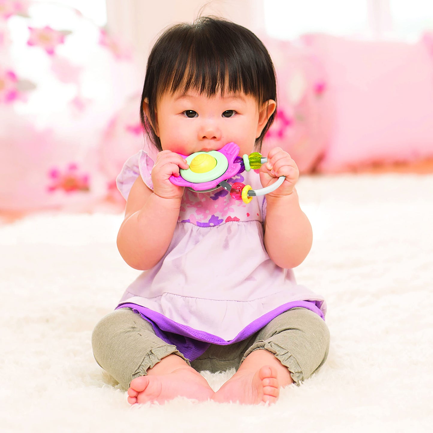 Infantino Spin & Teethe Gummy Pink Flower Rattle - Easy to Grab, Chewy Rings, Multi-Texutre Petals, Roller Ball Center - Teethin