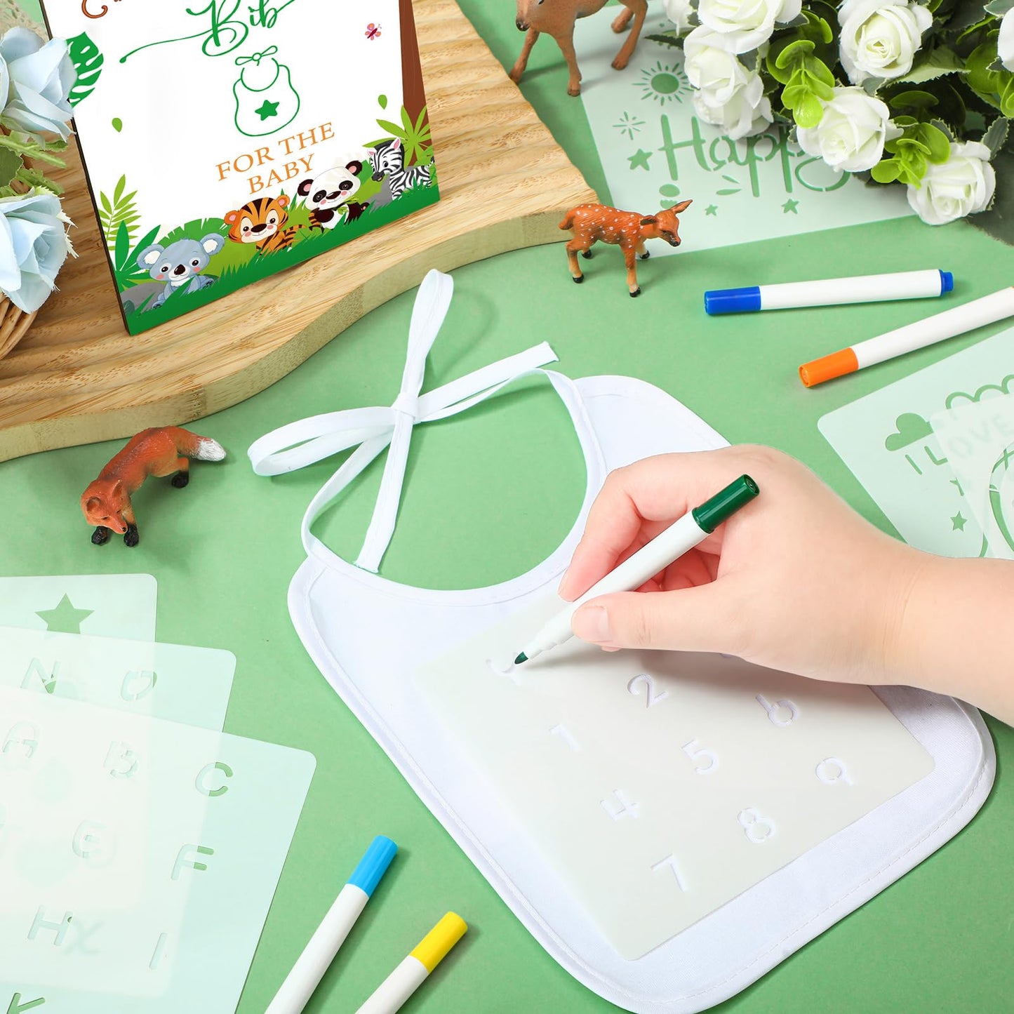 Panitay 100 Pcs Diy Baby Bibs Decorating Kit 50 White Bibs 25 Stencils 24 Fabric Markers 1 Baby Shower Game Sign(Forest Animal)