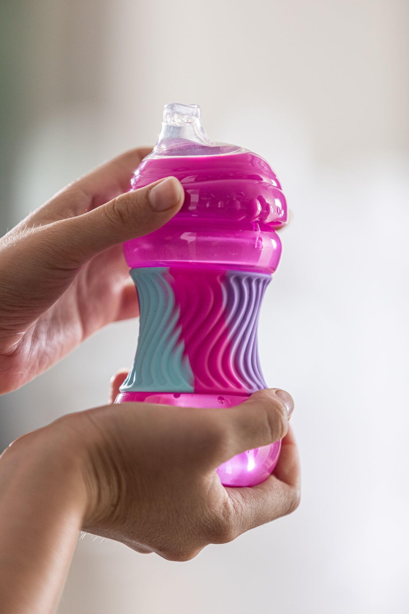 Nuby No Spill Sili Bands 10Oz Soft Spout Cup With Textured Easy Grip Silicone Band - Pink