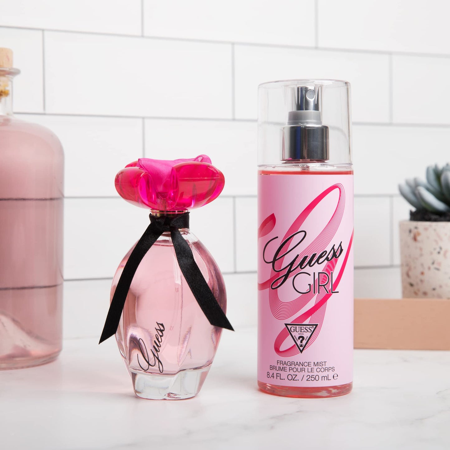 GUESS Girl Eau de Toilette 3 Piece Gift Set - Perfume Spray 3.4 Fl. Oz., Travel Spray 0.5 Fl. Oz., & Body Lotion 6.7 Fl. Oz.