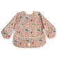 mushie Long Sleeve Baby Bib | Water Resistant Adjustable Fit for Ages 6-24 Months (Abstract Blob)
