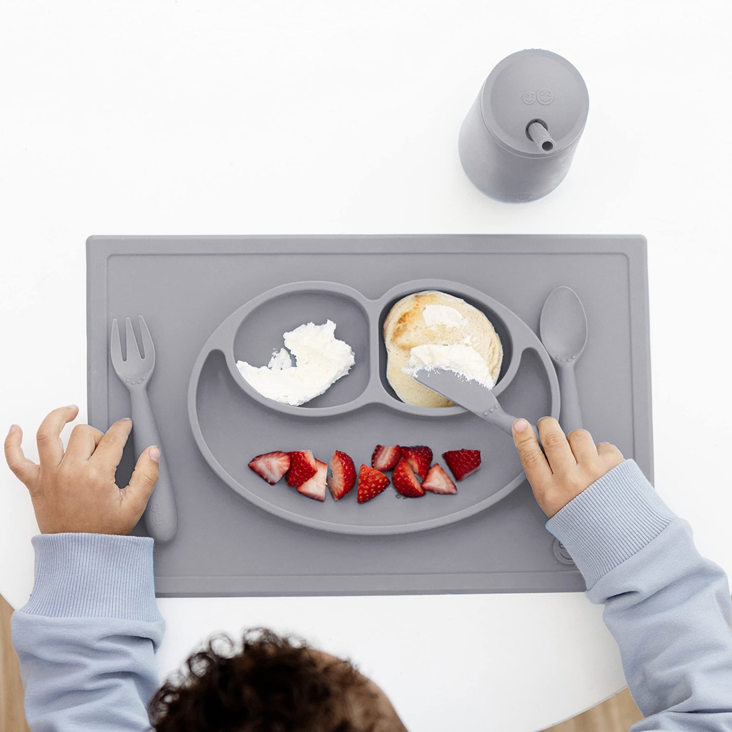ezpz Happy Mat - 24 Months+ (Gray) - 100% Silicone Suction Plate with Built-in Placemat for Toddlers + Preschoolers - Divided To