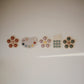mushie Flower Press Toy (Dried Thyme/Natural/Shifting Sand)