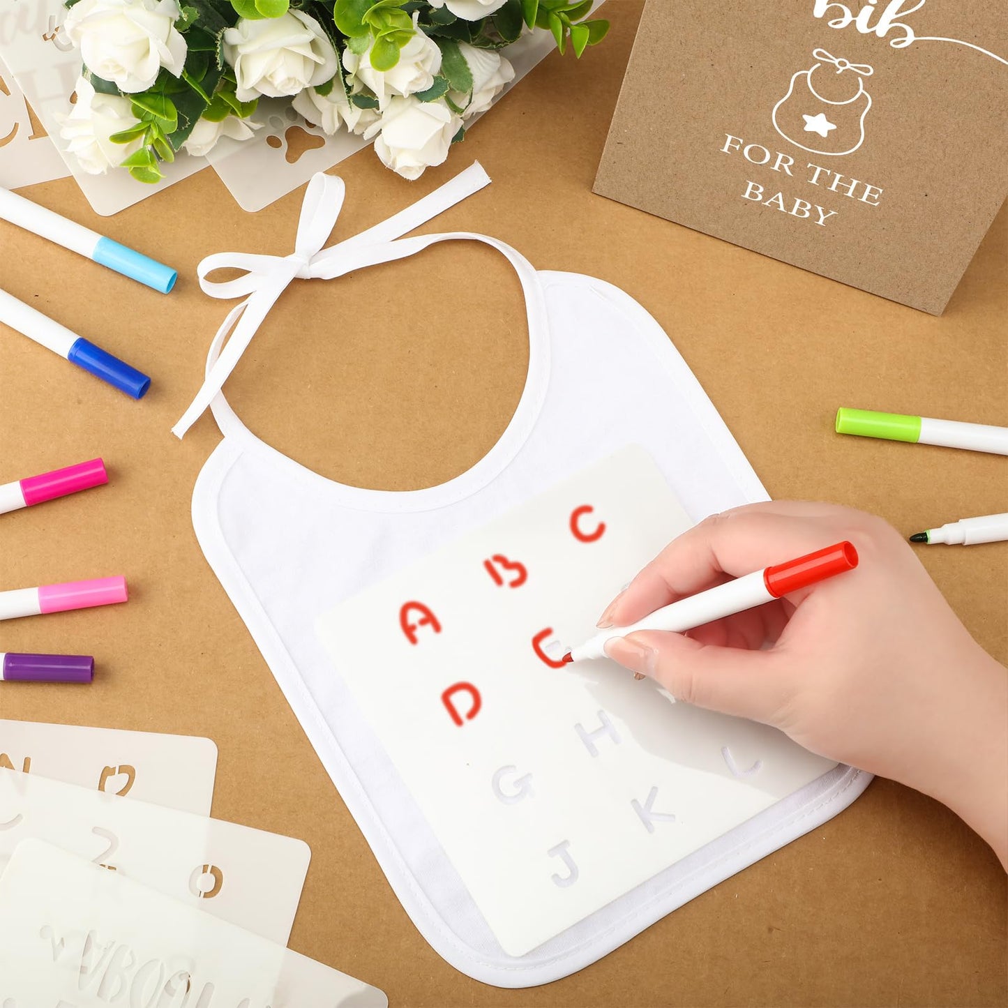 Panitay 100 Pcs Diy Baby Bibs Decorating Kit 50 White Bibs 25 Stencils 24 Fabric Markers 1 Baby Shower Game Sign(Kraft)