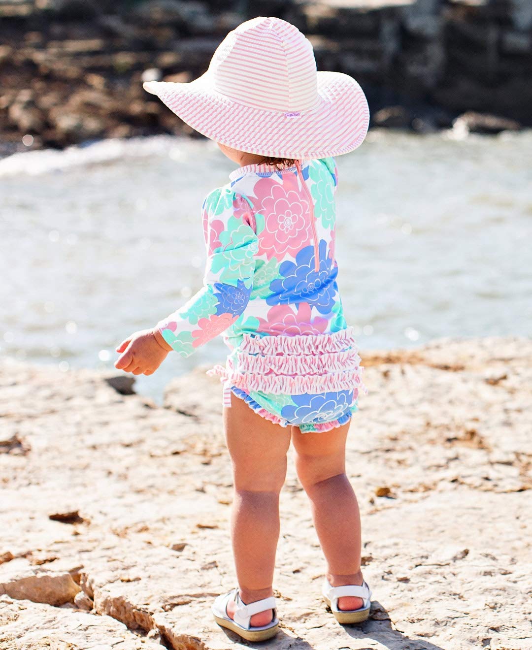 RuffleButts Baby Girls UPF 50+ Sun Protection Floral Printed Long Sleeve One Piece Rash Guard Swimsuit with Zipper - Pastel Peta