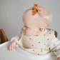 Mushie Silicone Baby Bib | Adjustable Fit Waterproof Bibs (Black Daisy)