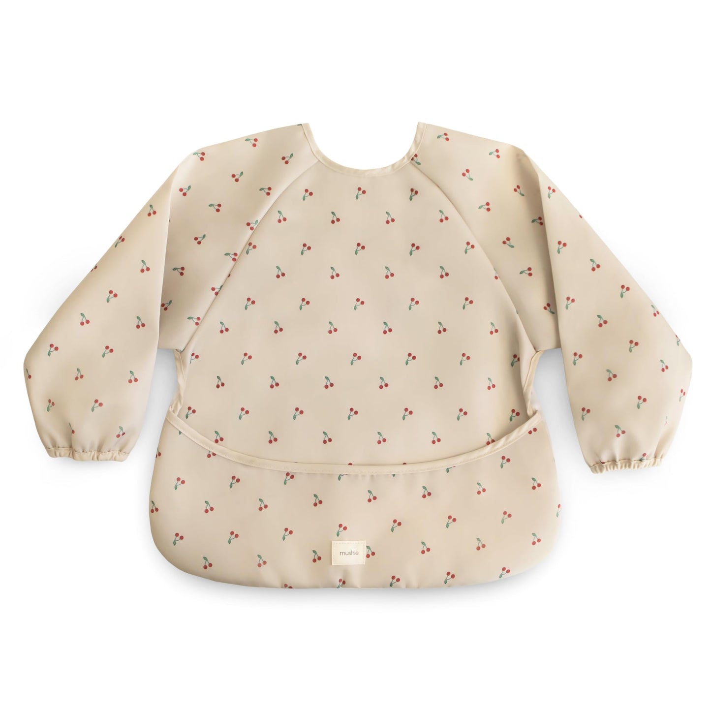 mushie Long Sleeve Baby Bib | Water Resistant Adjustable Fit for Ages 6-24 Months (Cherries)