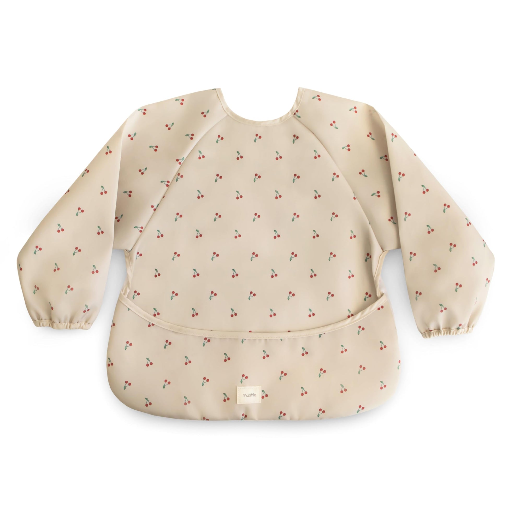 mushie Long Sleeve Baby Bib | Water Resistant Adjustable Fit for Ages 6-24 Months (Cherries)