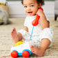 Fisher-Price Toddler Pull Toy Chatter Telephone Pretend Phone with Rotary Dial and Wheels for Walking Play Ages 1+ years