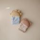 mushie Silicone Teething Mitten for Babies 3 Months+ (Sun) | Textured Silicone & Sensory Fabric with Adjustable Strap