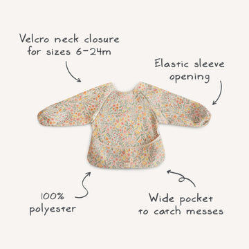 mushie Long Sleeve Baby Bib | Mess Free & Waterproof Fabric for Toddlers | Adjustable Fit for Ages 6-24 Months (Retro Flowers)
