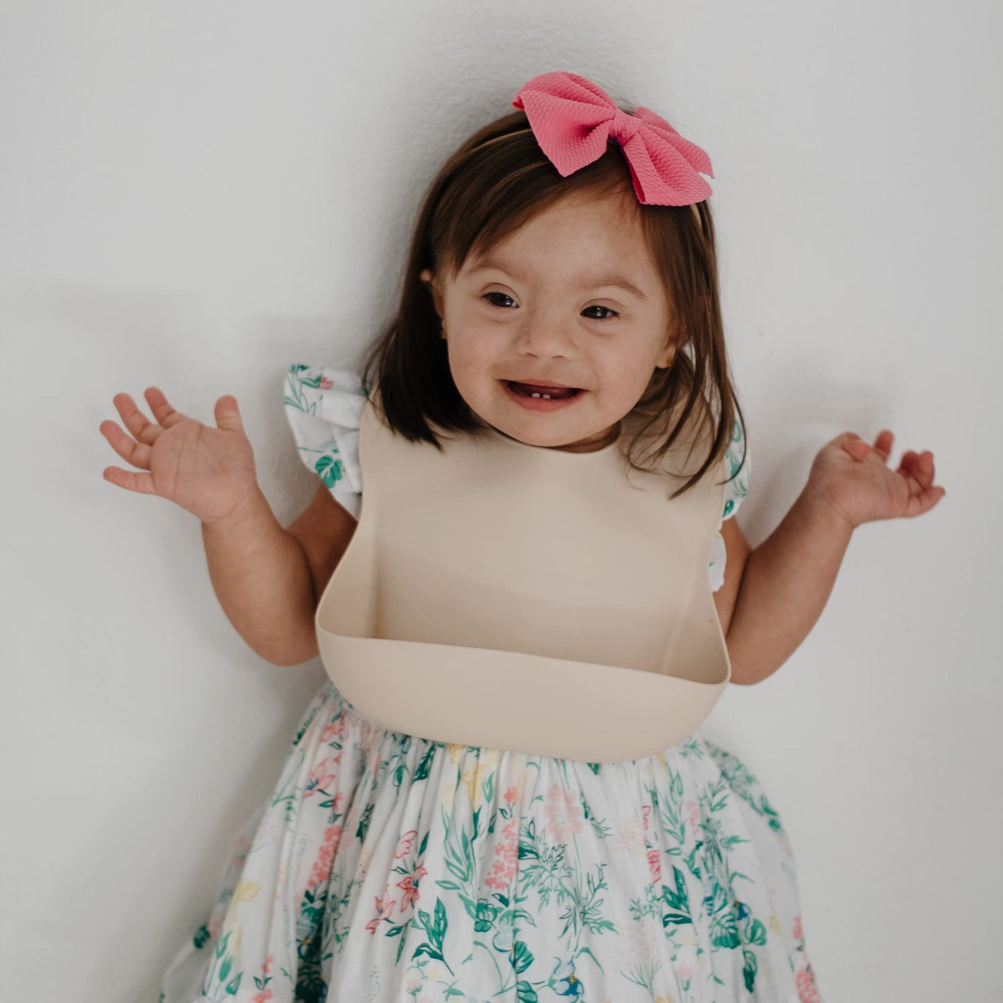 Mushie Silicone Baby Bib | Adjustable Fit Waterproof Bibs (Daisy)