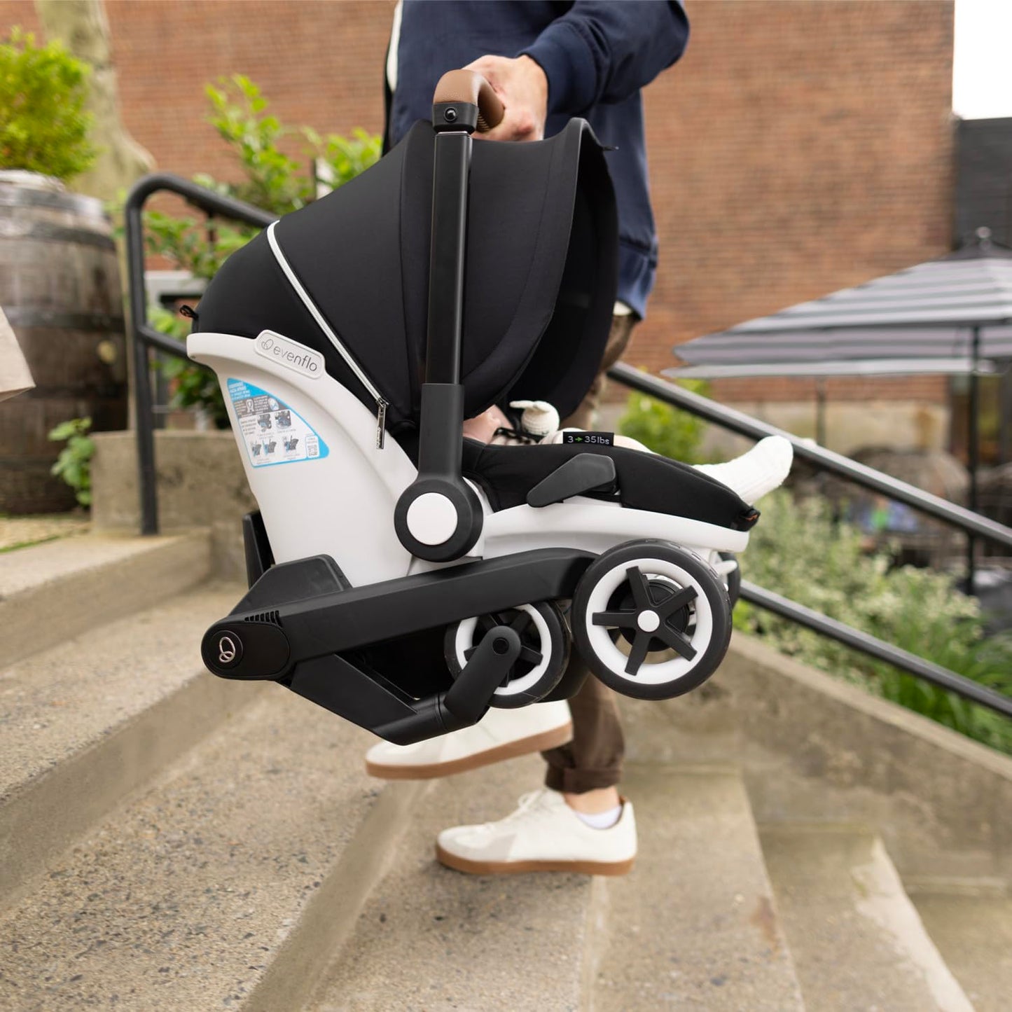 Evenflo Gold Shyft Dualride With Carryall Storage Infant Car Seat And Stroller Combo (Onyx Black)