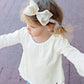 Rufflebutts Girls Ivory Bow Headband - One Size