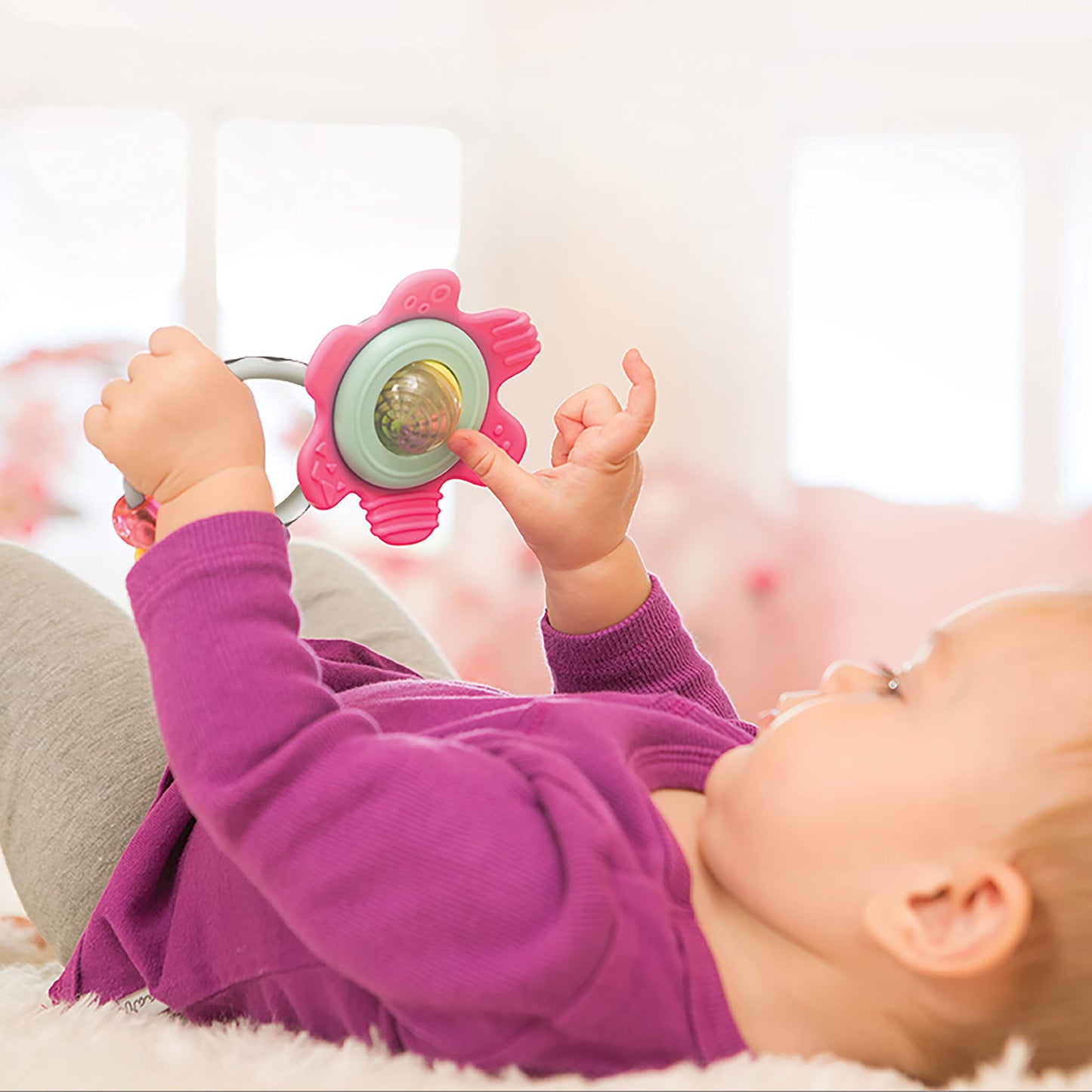 Infantino Spin & Teethe Gummy Pink Flower Rattle - Easy to Grab, Chewy Rings, Multi-Texutre Petals, Roller Ball Center - Teethin