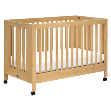 babyletto Maki Full-Size 2-in-1 Portable Folding Crib with Toddler Bed Conversion Kit in Honey, Greenguard Gold Certified