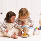 Le Toy Van - Wooden Rainbow Stacker | Girl & Boy 7 Piece Rainbow Wobbling Ring Stacker - Suitable for 18+ Months