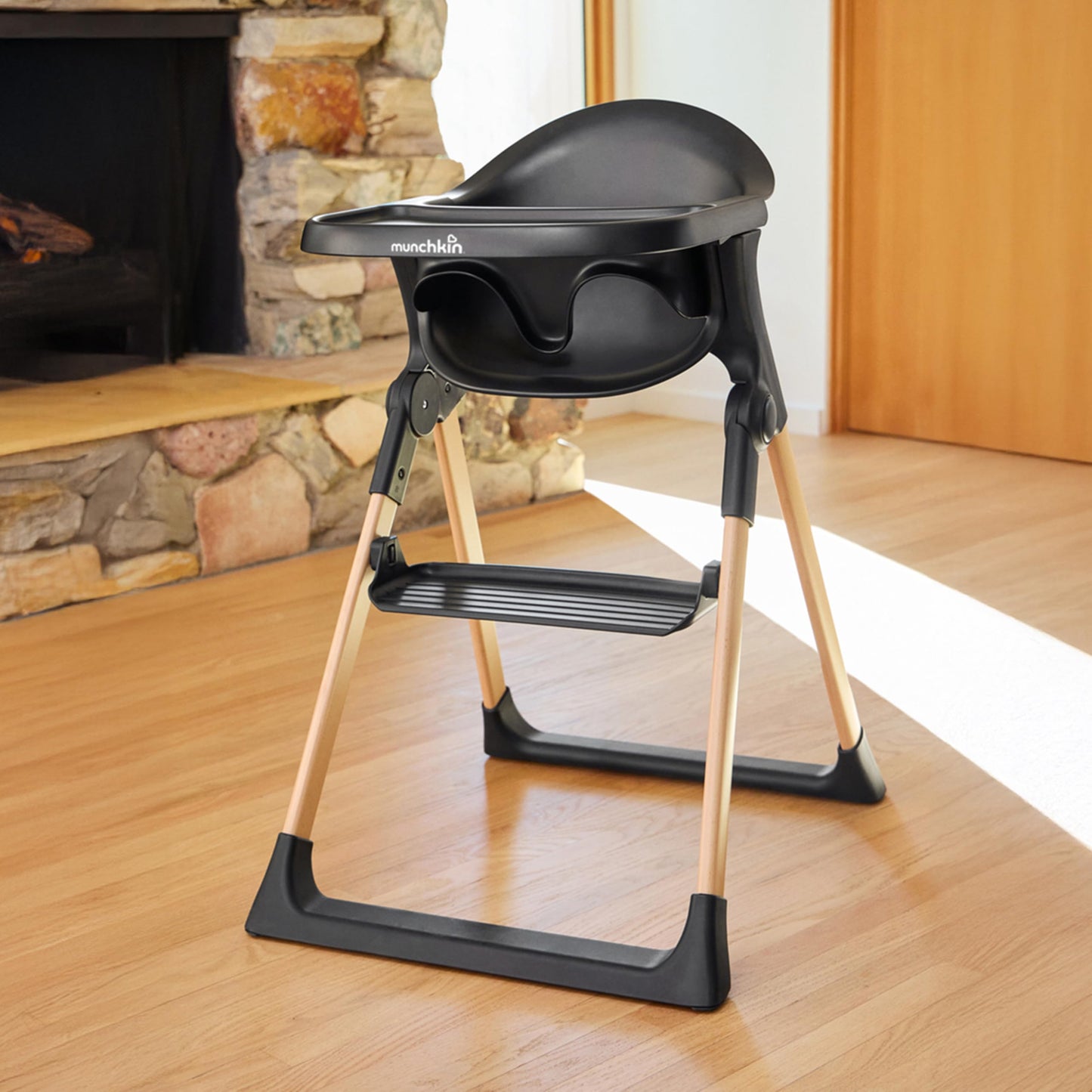 Munchkin Float Baby High Chair, Foldable And Easy To Clean, For Babies And Toddlers, Black With Wooden Legs