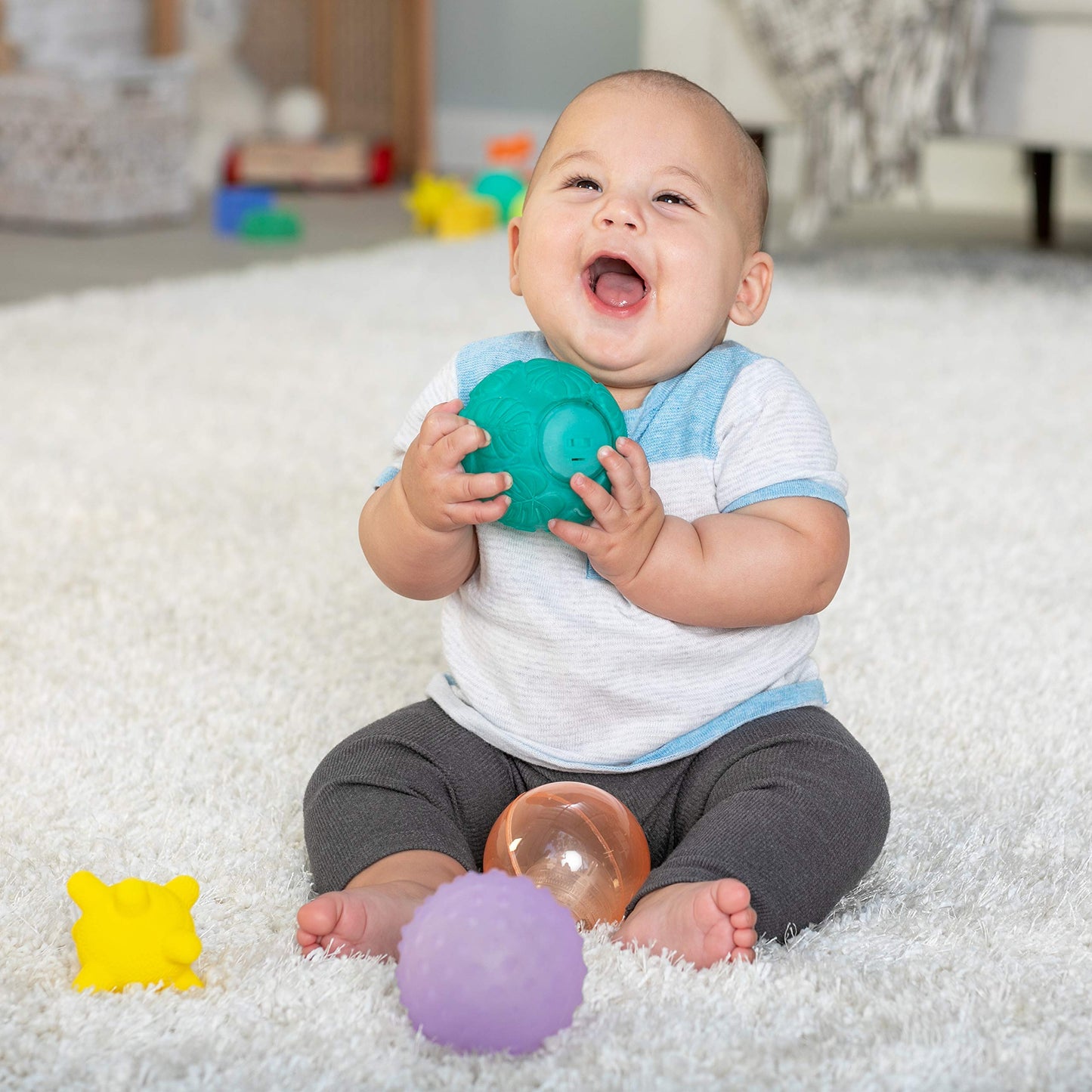 Infantino Activity Ball Set Music & Lights - 4 Colorful, Bouncy, & Multi-Textured Balls for Fine Motor Development for Little Ha