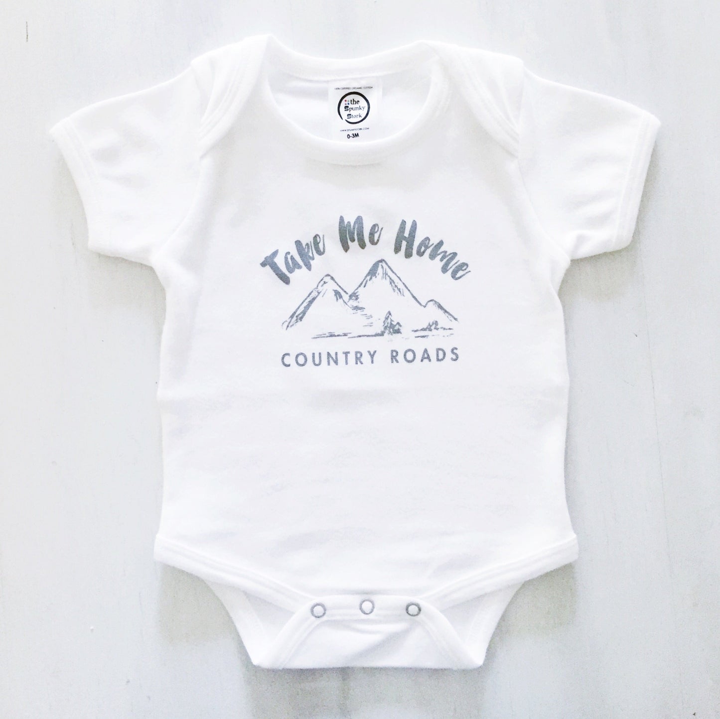 The Spunky Stork Take Me Home Country Roads Organic Cotton Baby Bodysuit (12-18M) White
