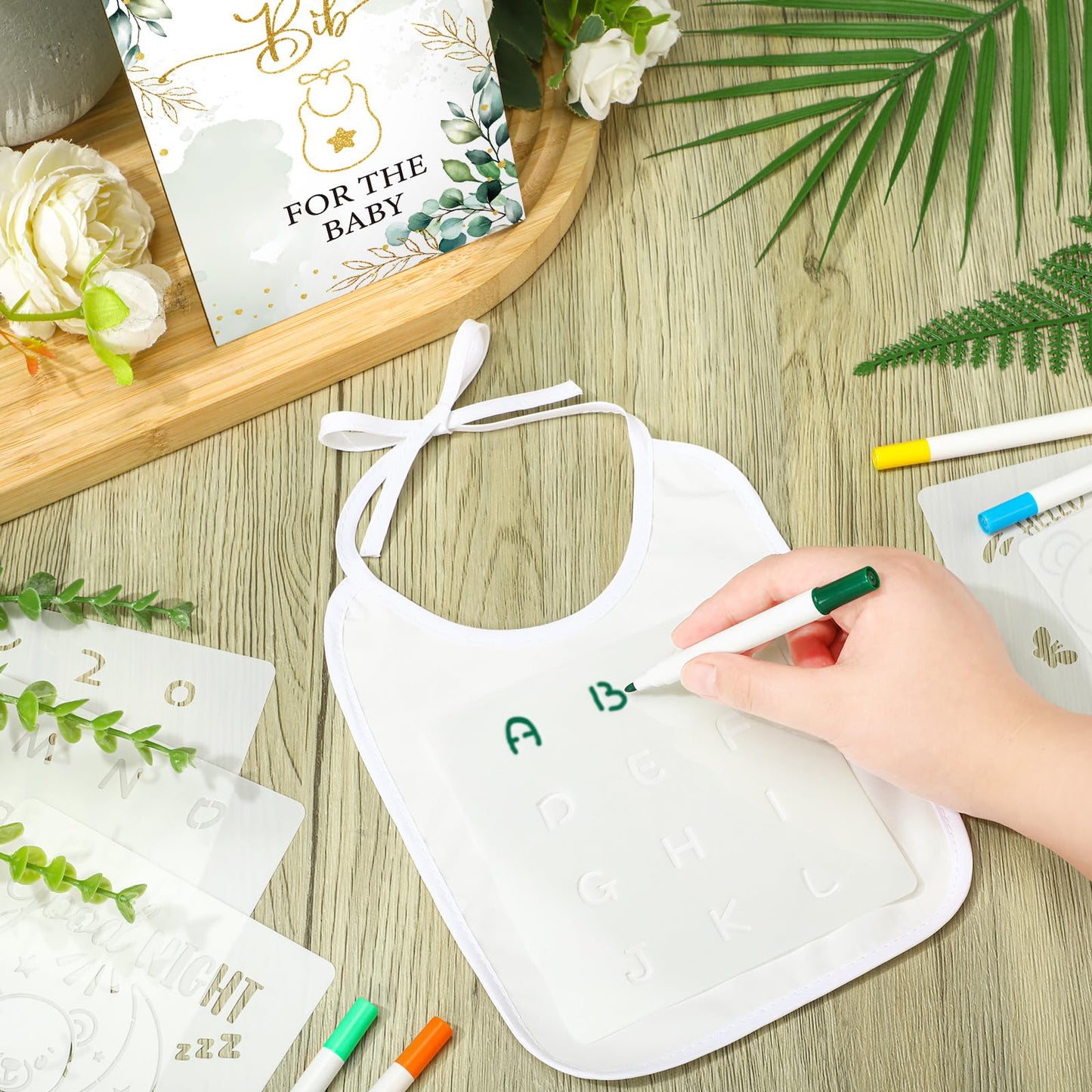 Panitay 100 Pcs Diy Baby Bibs Decorating Kit 50 White Bibs 25 Stencils 24 Fabric Markers 1 Baby Shower Game Sign(Leaf)