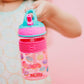 Nuby Thirsty Kids Flip-It Freestyle On The Go Water Bottle With Bite Resistant Hard Straw Cup And Easy Grip Band, Pink Donuts, 1