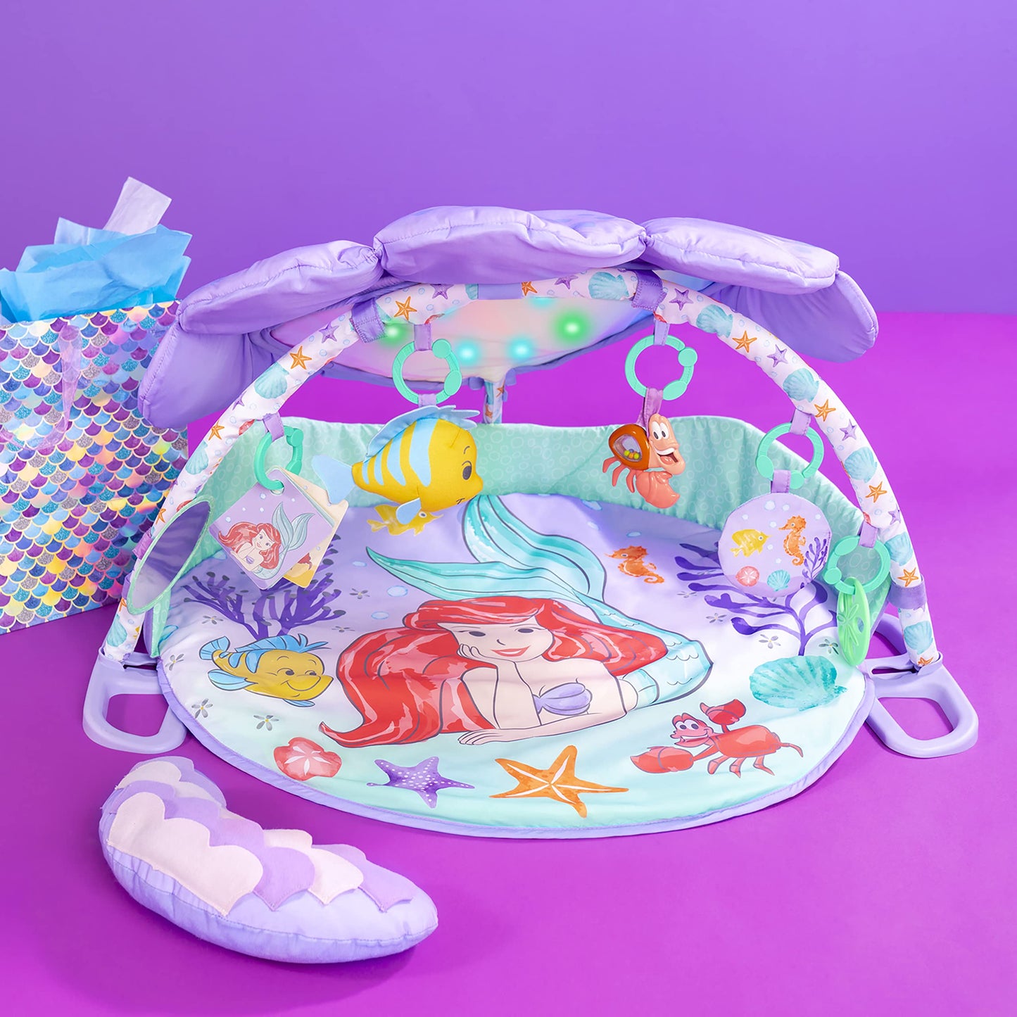 Bright Starts Disney Baby The Little Mermaid Twinkle Trove Light-Up Musical Baby Activity Gym with Tummy Time Pillow, Newborn+