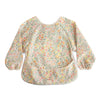 mushie Long Sleeve Baby Bib | Mess Free & Waterproof Fabric for Toddlers | Adjustable Fit for Ages 6-24 Months (Pastel Blooms)