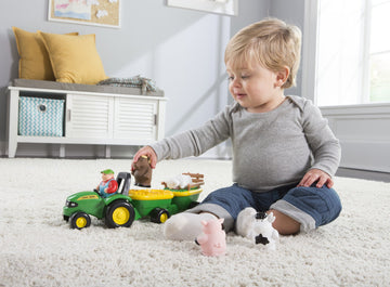 TOMY John Deere Animal Sounds Hayride Musical Tractor Toy - Musical Hayride and Farm Animal Toddler Toys - Includes Farmer Figur