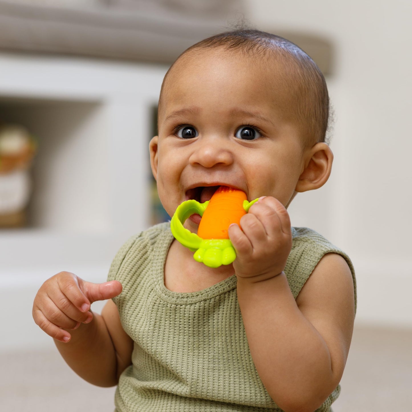 Infantino Lil Nibbles Textured Silicone Baby Teether - Sensory Exploration and Teething Relief with Easy to Hold Handles, Orang