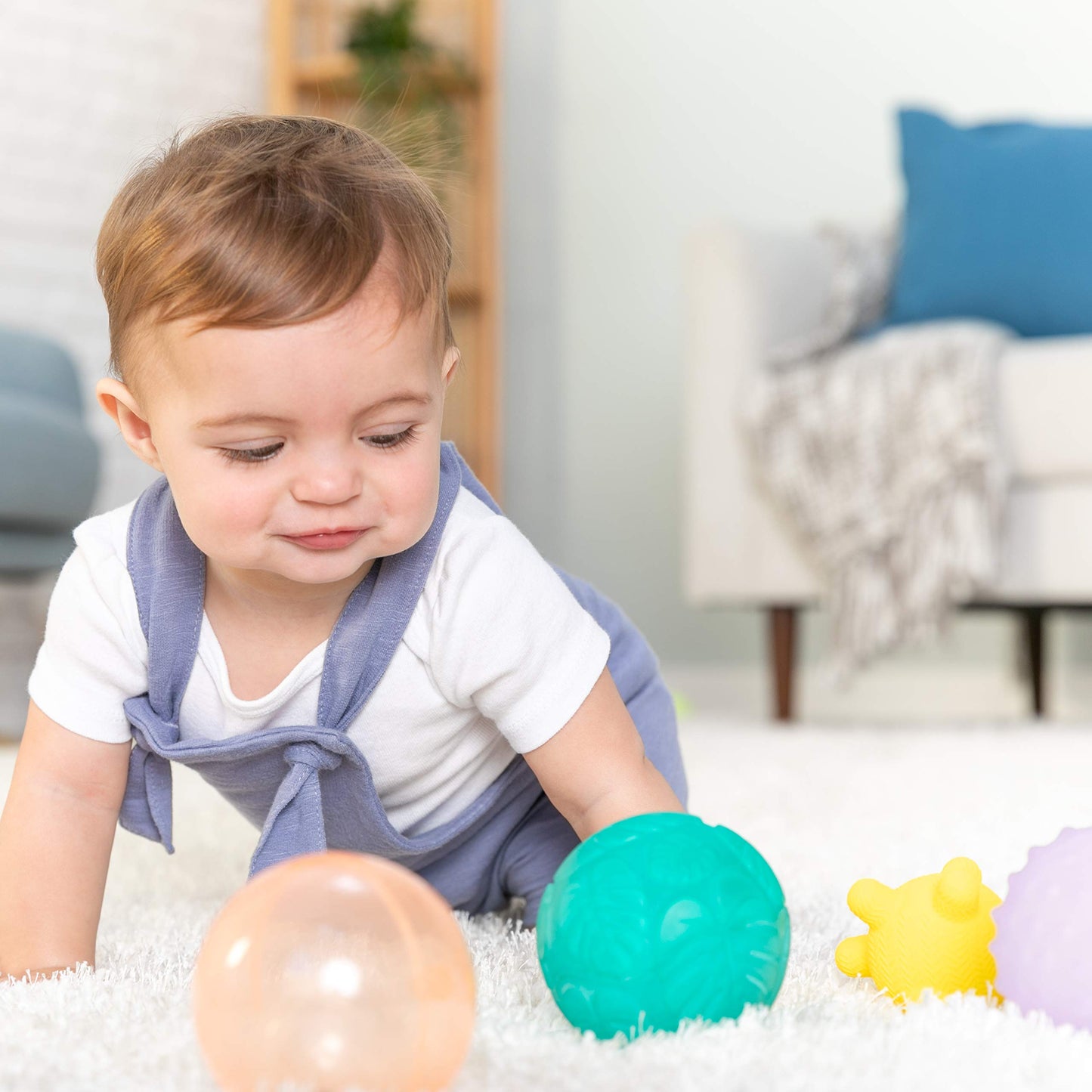 Infantino Activity Ball Set Music & Lights - 4 Colorful, Bouncy, & Multi-Textured Balls for Fine Motor Development for Little Ha