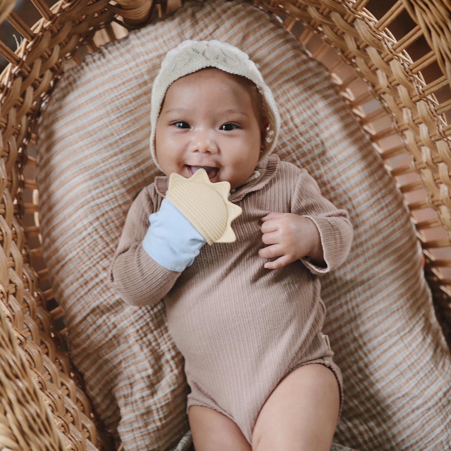 mushie Silicone Teething Mitten for Babies 3 Months+ (Sun) | Textured Silicone & Sensory Fabric with Adjustable Strap