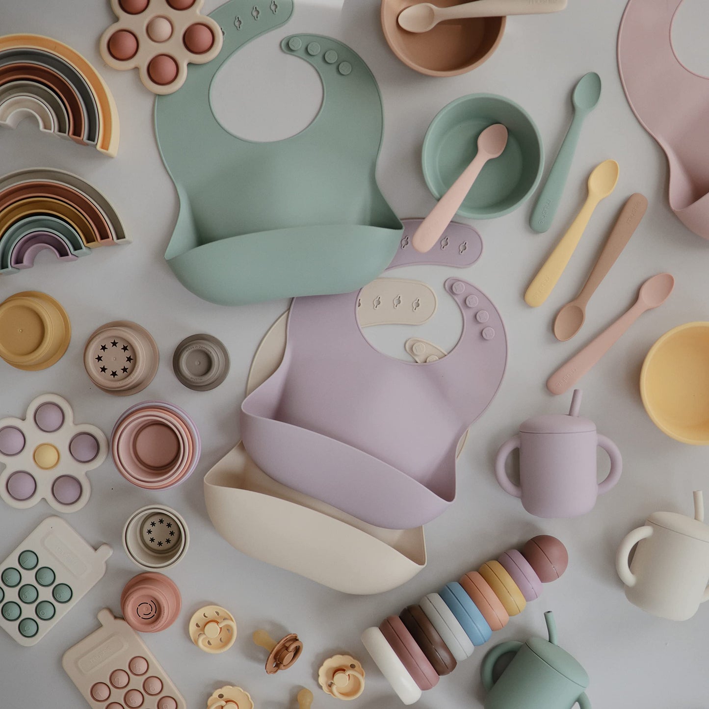 Mushie Silicone Baby Bib | Adjustable Fit Waterproof Bibs (Pale Mauve)