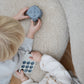 mushie Silicone Dice Press Toy | Baby Sensory Play for 10+ Months (Tradewinds/Stone)