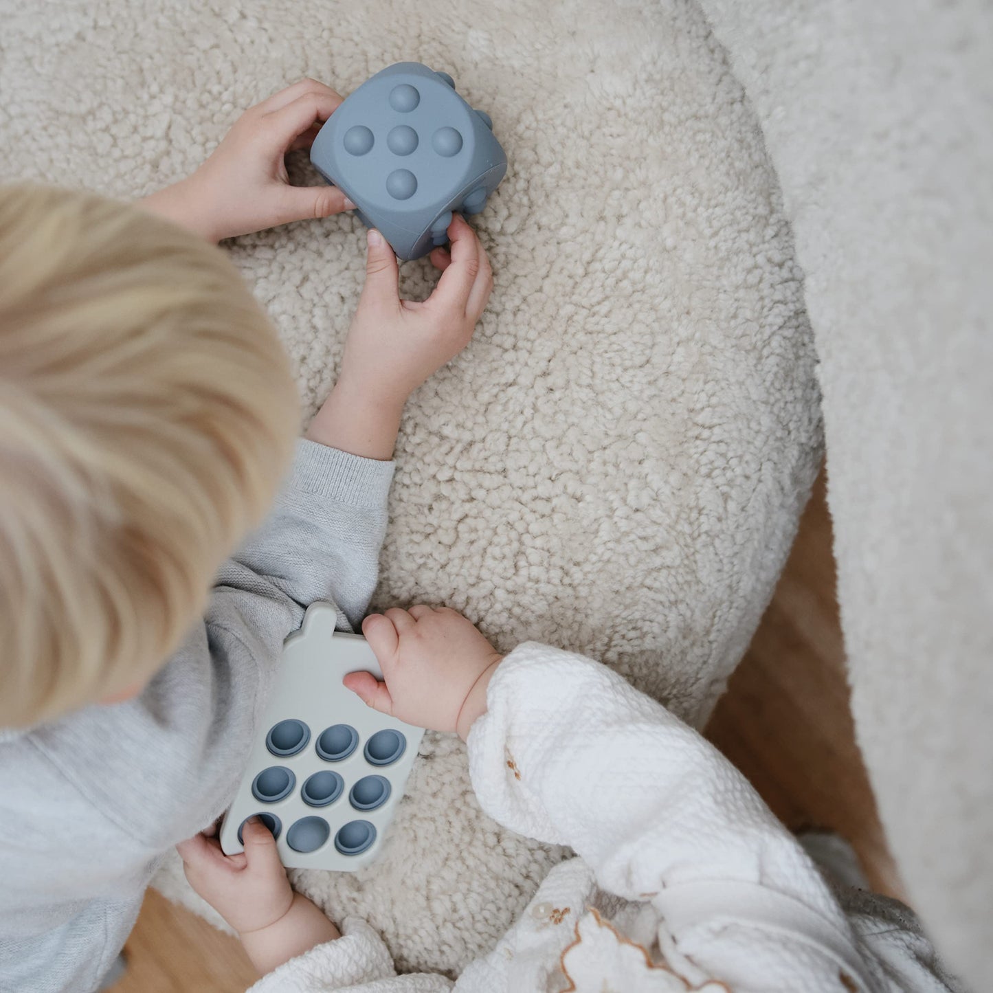 mushie Silicone Dice Press Toy | Baby Sensory Play for 10+ Months (Tradewinds/Stone)