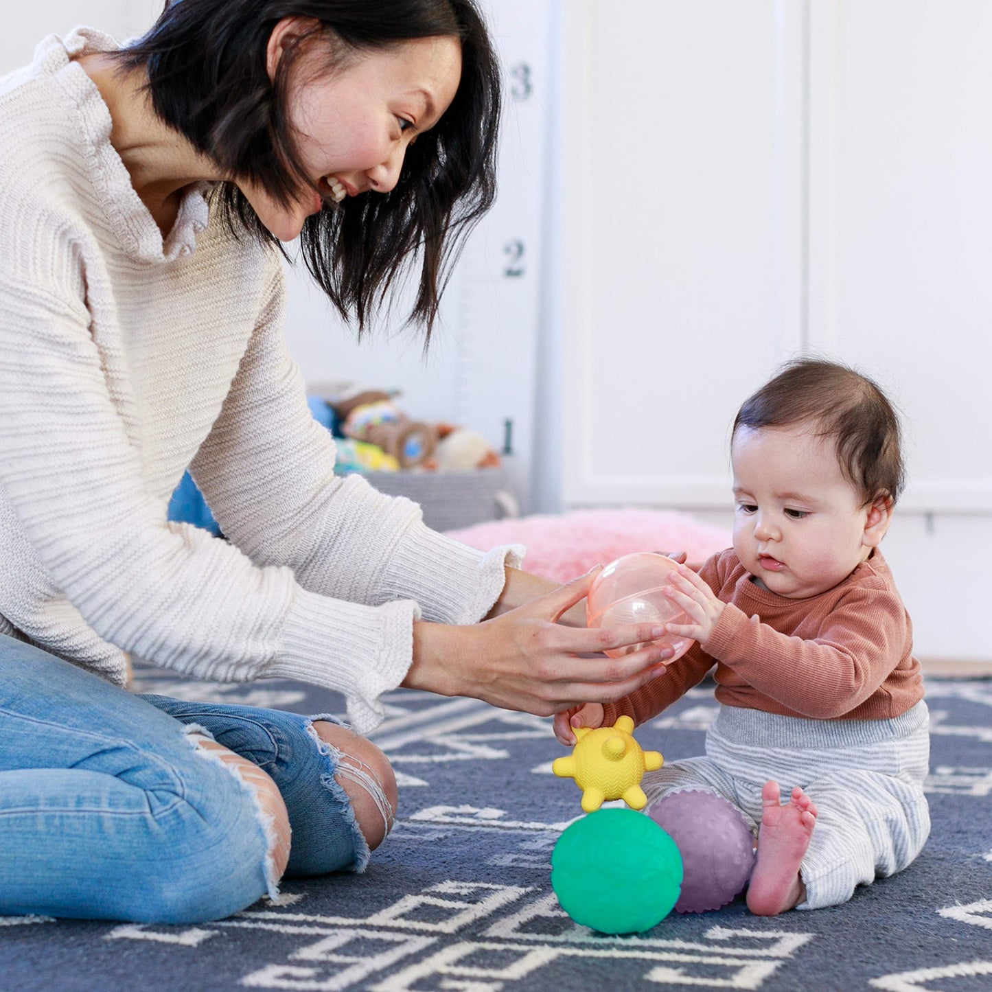 Infantino Activity Ball Set Music & Lights - 4 Colorful, Bouncy, & Multi-Textured Balls for Fine Motor Development for Little Ha
